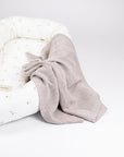 Sand Blanket in Merino Wool: Coziness and Elegance