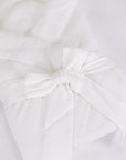 Envoltorio Blanco: Tranquilidad en forma de algodón