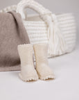 Raw Knitted Booties: Warmth and Care for the First Steps